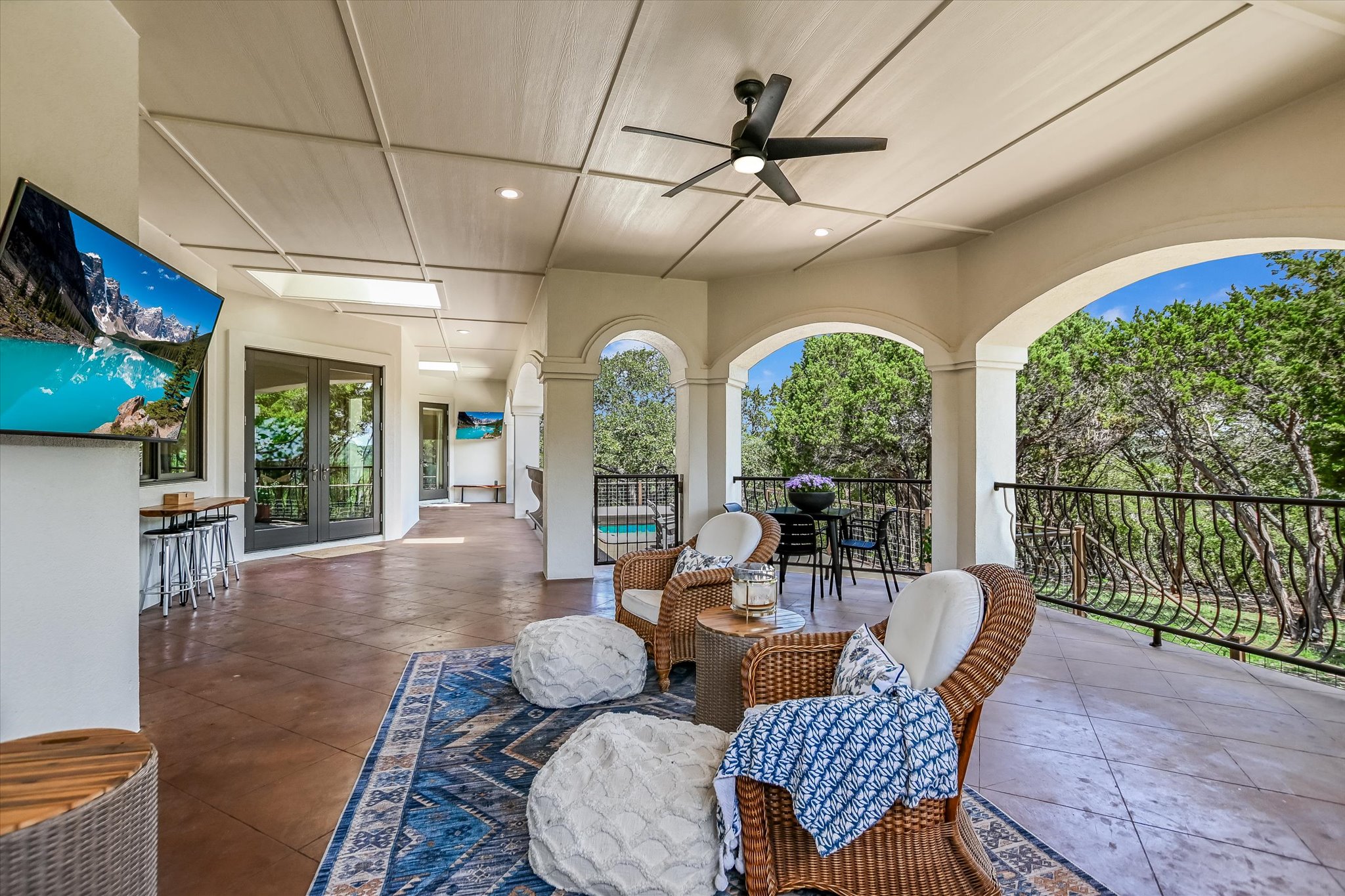 817 Woodcreek Ranch Road Wimberley, TX 78676 - Photo 22 of 40 Expansive patio w/2 wall mount TV's, Grill – permanent propane line