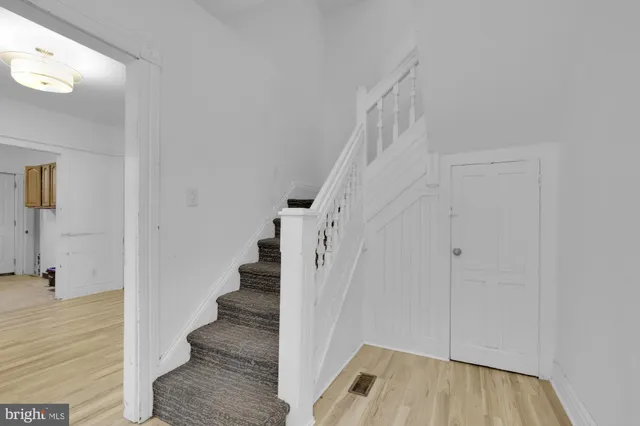 a view of entryway with wooden floor