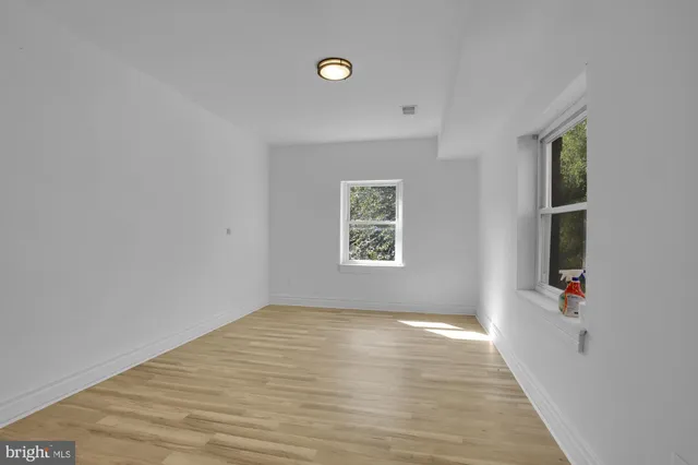 an empty room with windows