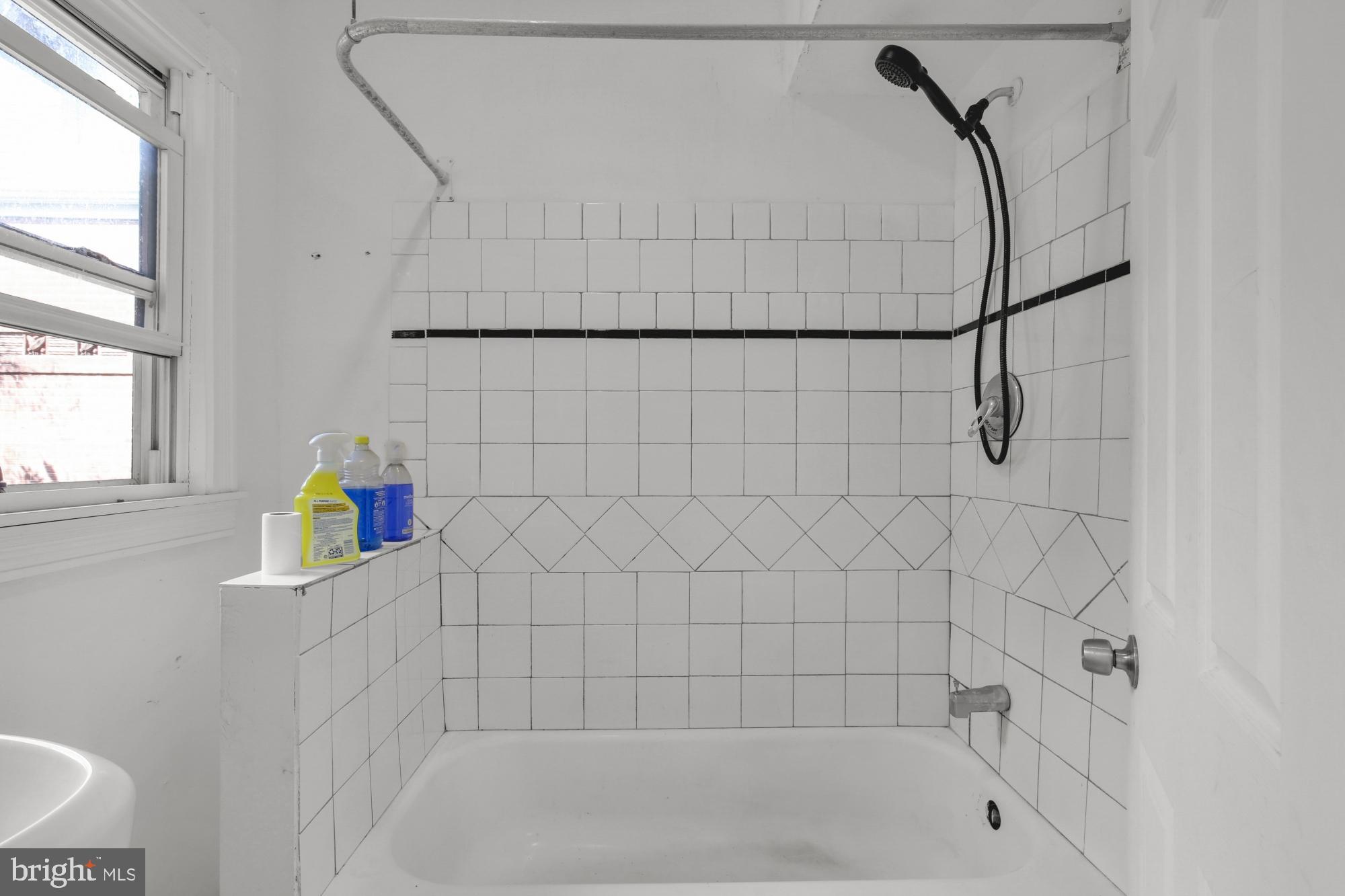 3215 Winter Street Philadelphia, PA 19104 - Photo 16 of 31 a bath room with a bath tub and a shower