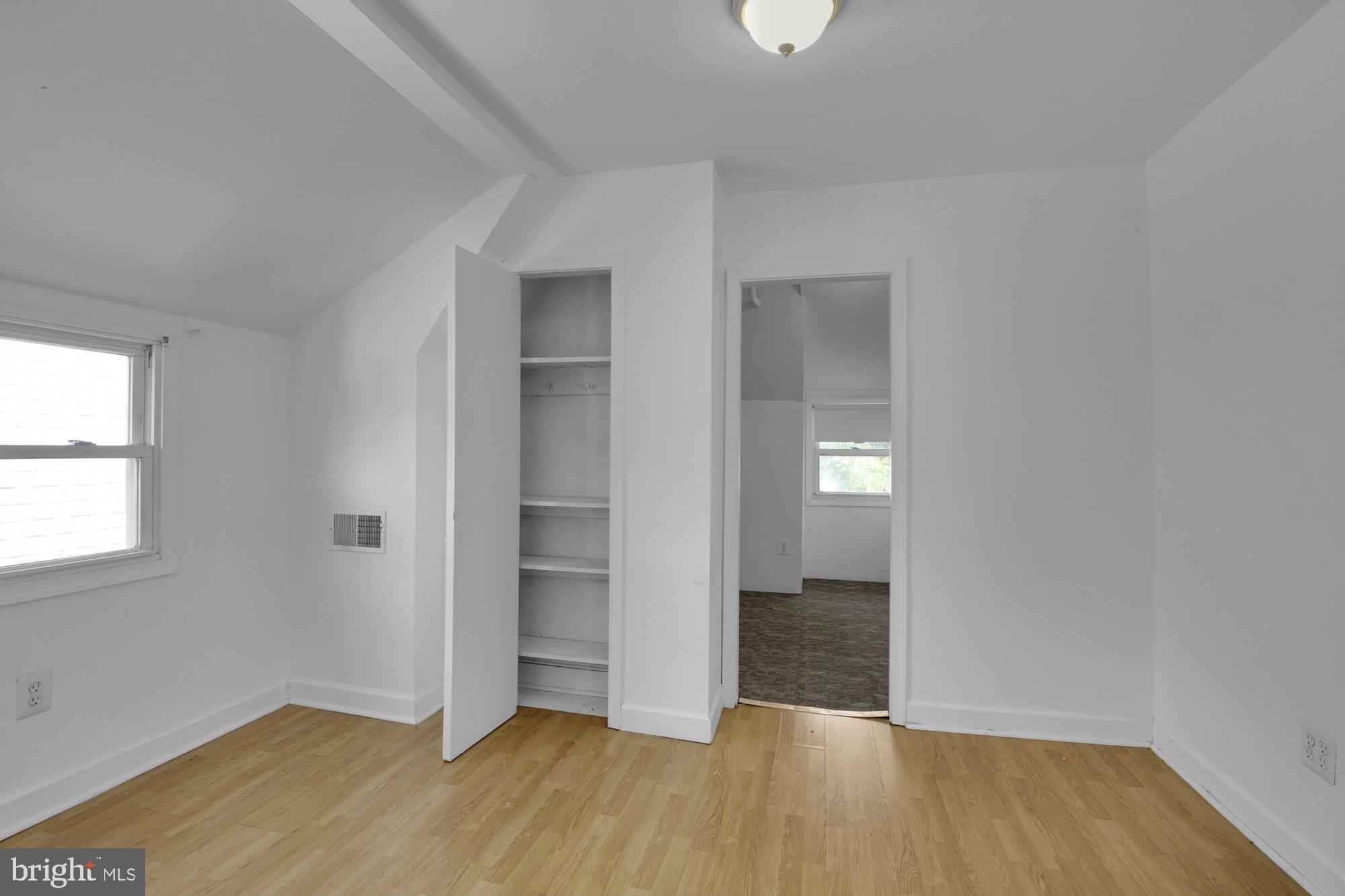 3215 Winter Street Philadelphia, PA 19104 - Photo 24 of 31 an empty room with wooden floor & closet and windows