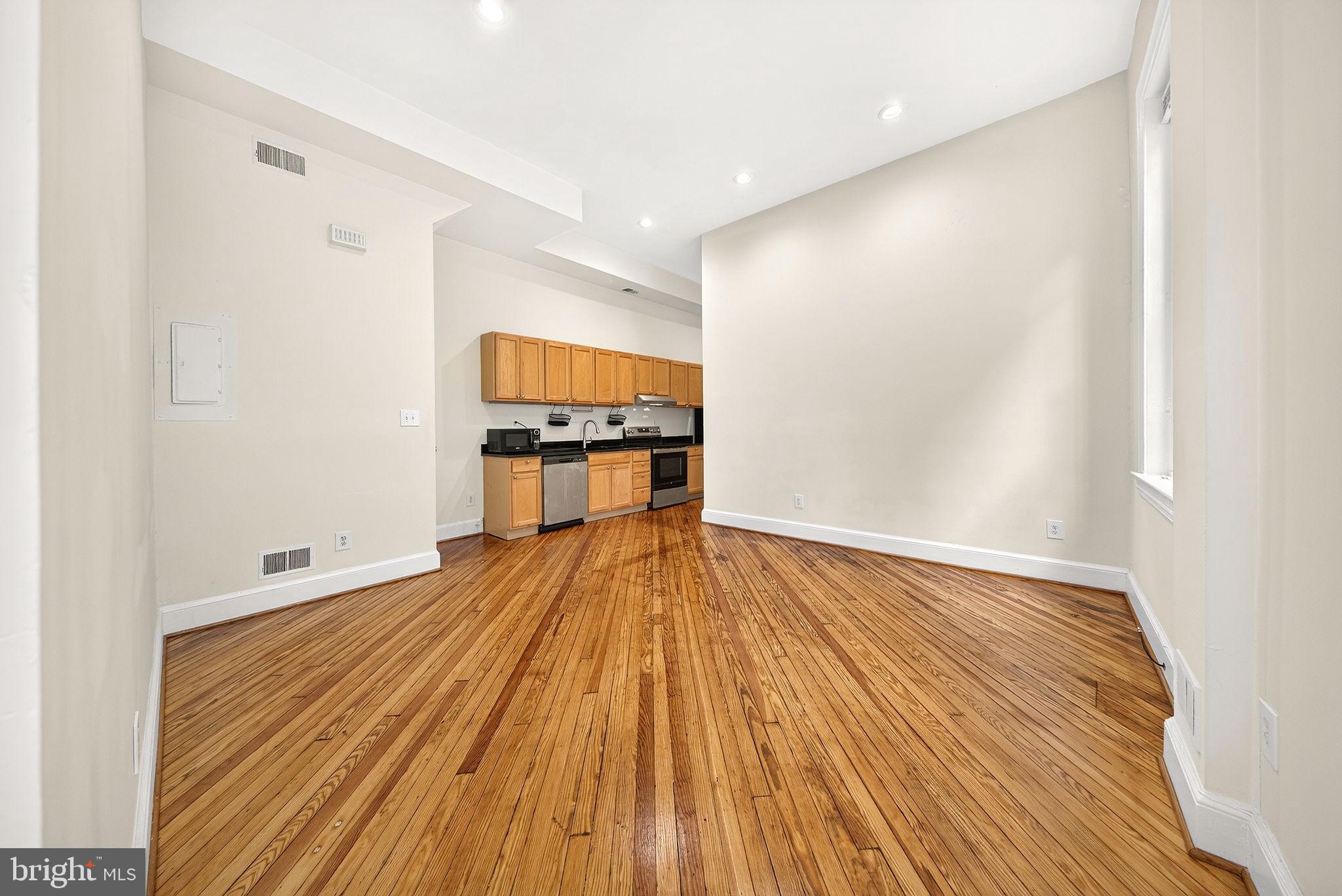 1213 12th Street Northwest, Unit A Washington, DC 20005 - Photo 30 of 34 Living + Kitchen