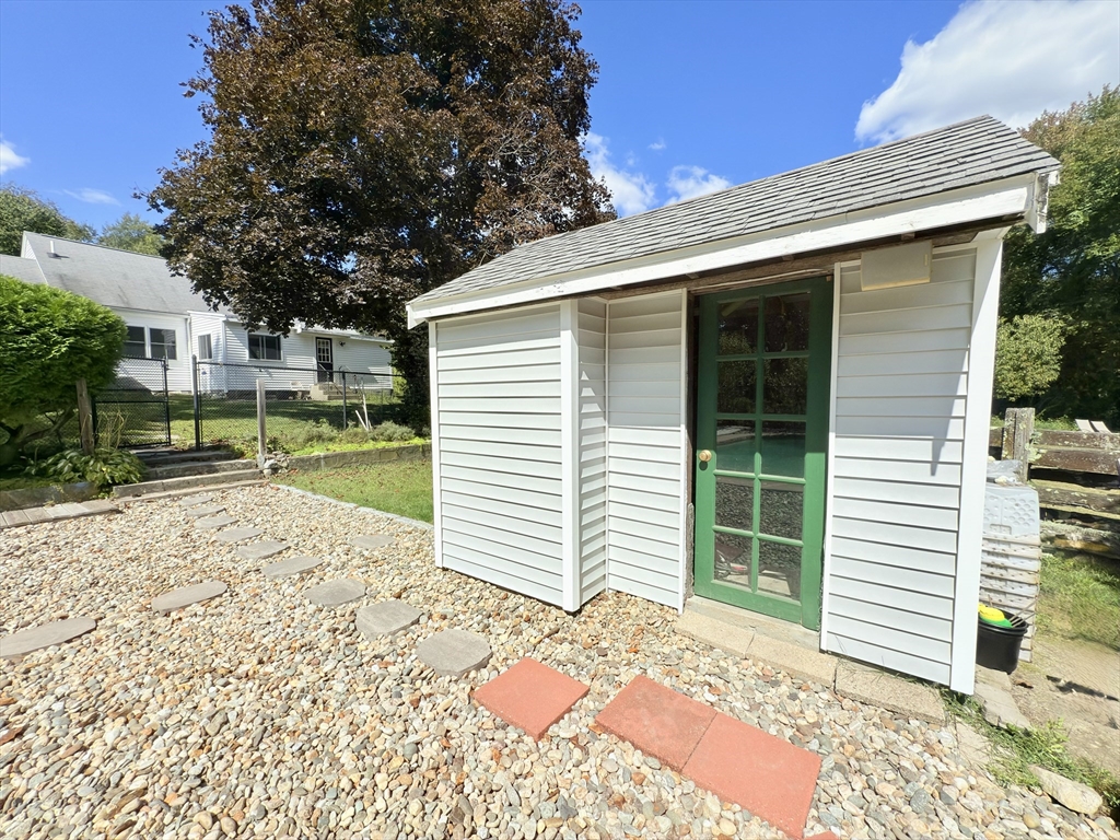 975 South Main Street Bellingham, MA 02019 - Photo 32 of 38 a front view of a house with a yard