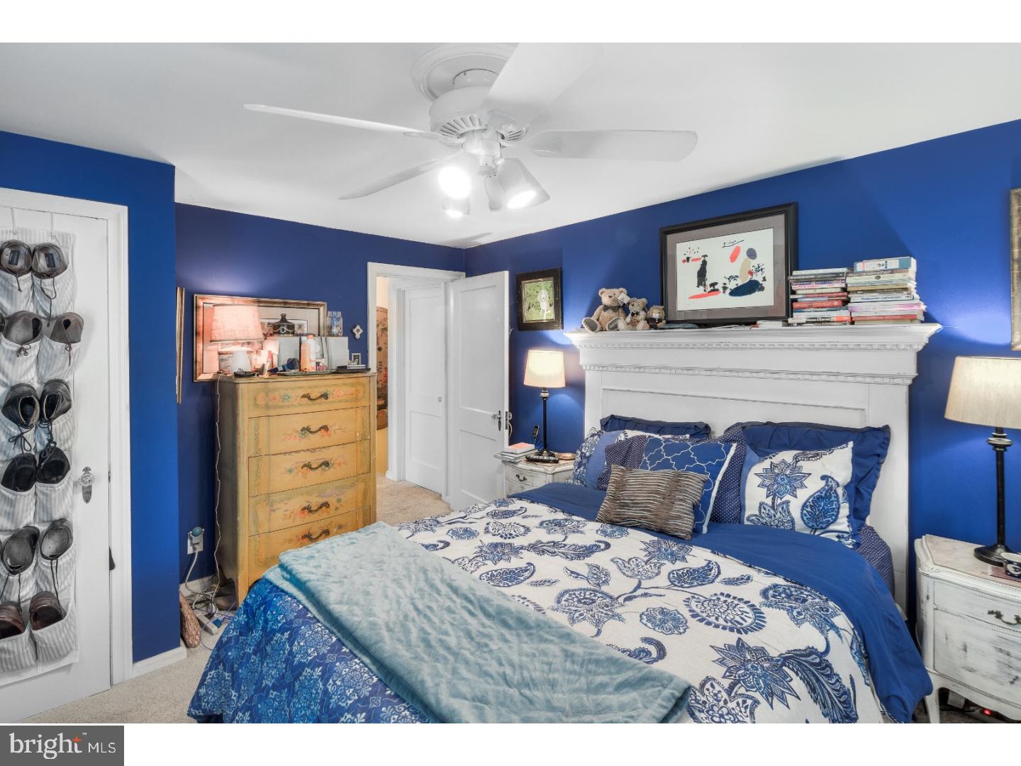 415 Earlington Road Havertown, PA 19083 - Photo 16 of 22 a bedroom with a bed and wooden floor