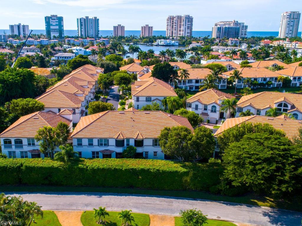 137 Colonade Circle, Unit 601 Naples, FL 34103 - Photo 28 of 28 a view of a city that has tall buildings