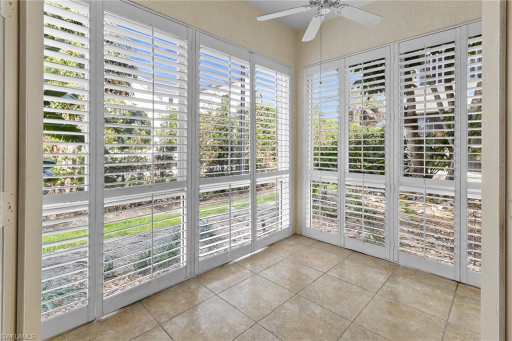 137 Colonade Circle, Unit 601 Naples, FL 34103 - Photo 4 of 28 a view of a room with windows