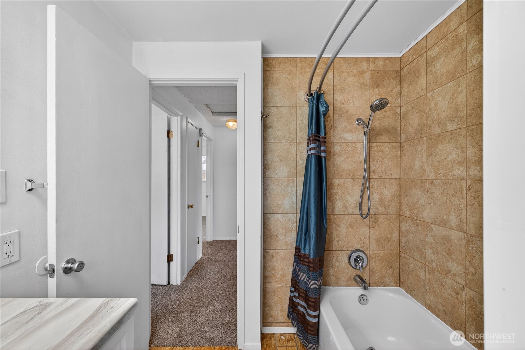 282 Southwest 10th Avenue Oak Harbor, WA 98277 - Photo 18 of 33 a bathroom with a sink a toilet a mirror and shower