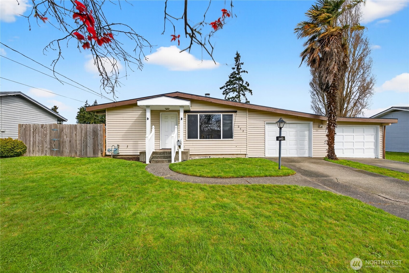 282 Southwest 10th Avenue Oak Harbor, WA 98277 - Photo 2 of 33 a view of a house with a yard