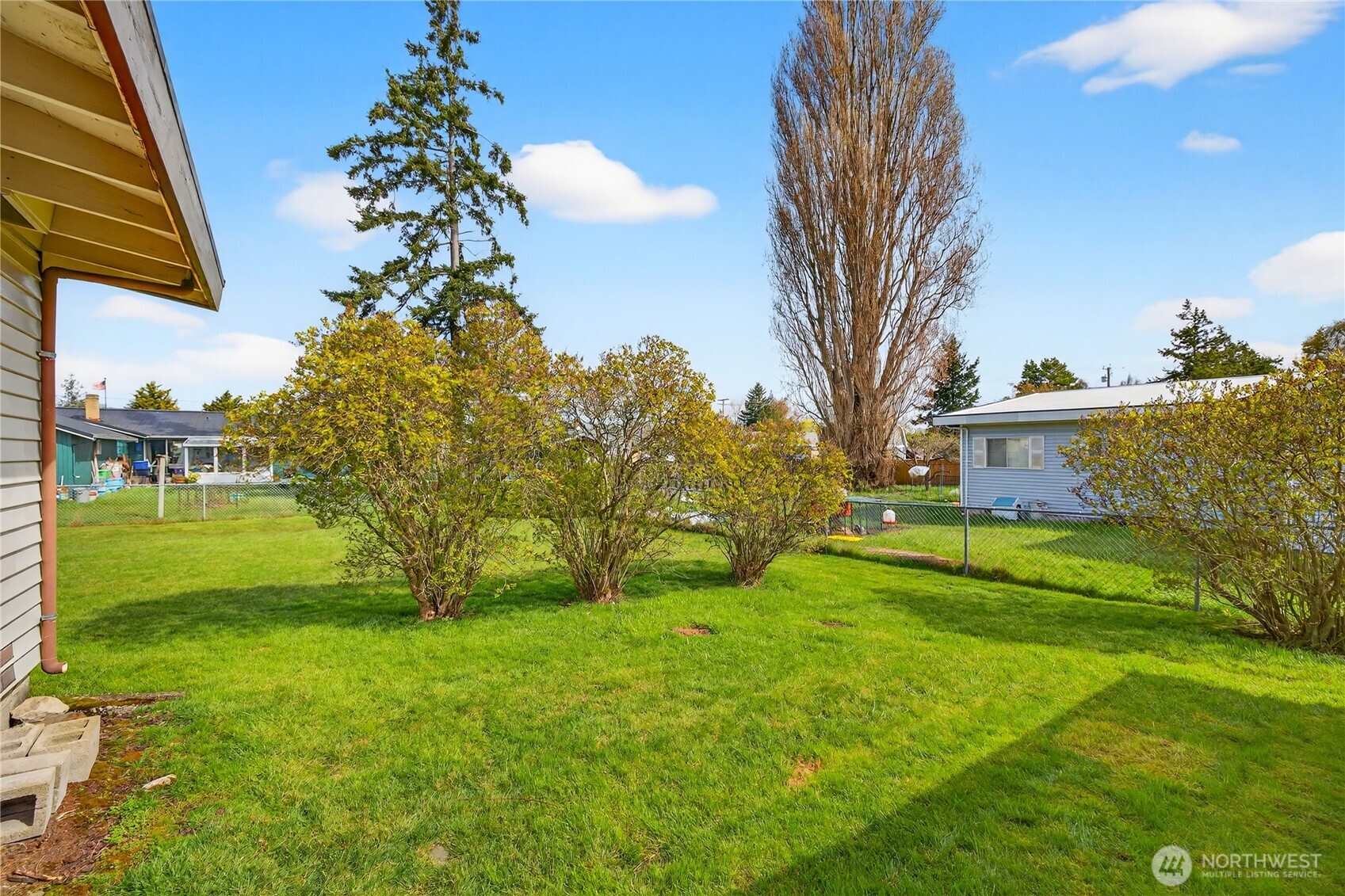 282 Southwest 10th Avenue Oak Harbor, WA 98277 - Photo 26 of 33 a view of a house with a yard