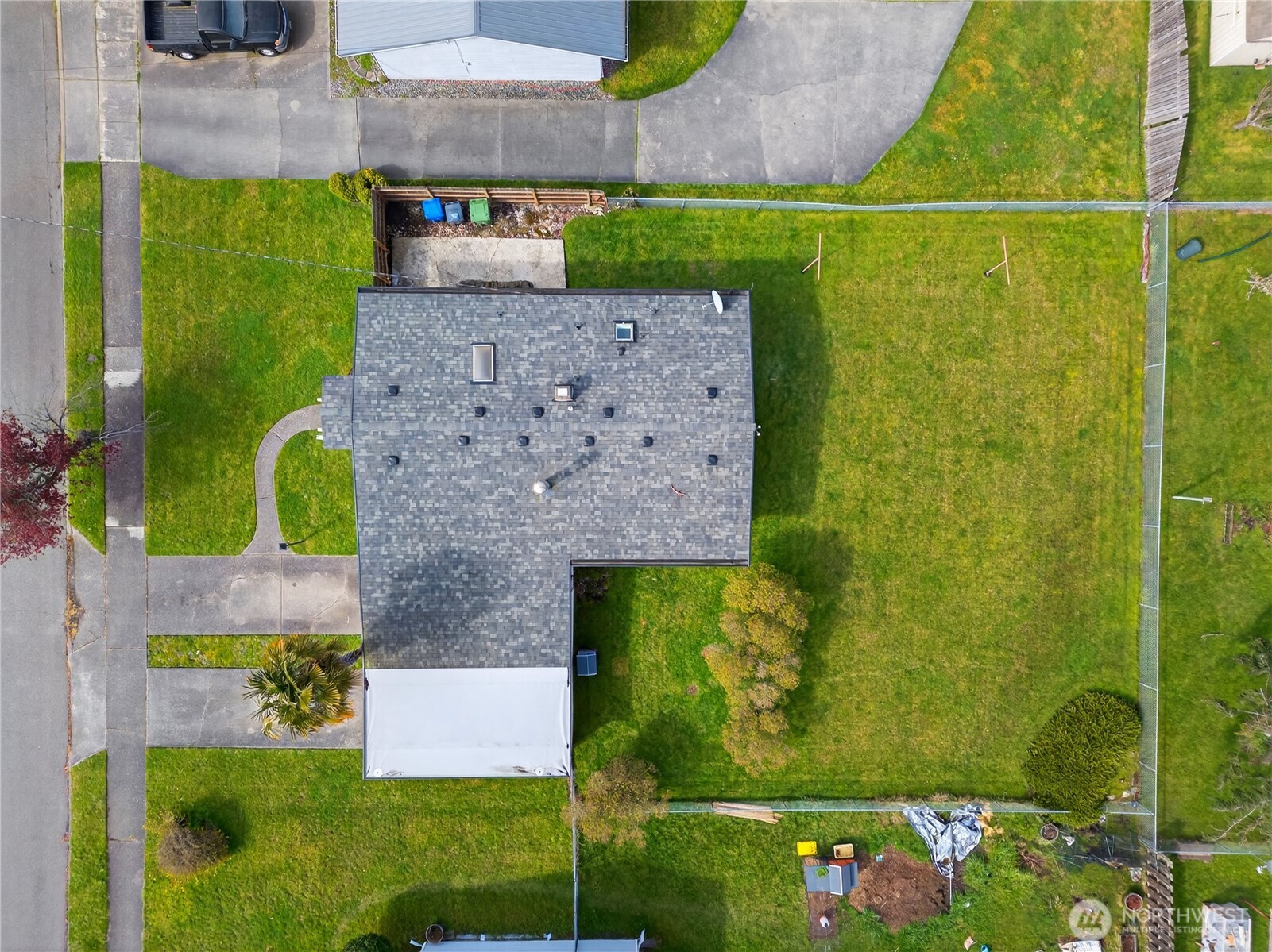 282 Southwest 10th Avenue Oak Harbor, WA 98277 - Photo 29 of 33 an aerial view of a house with a yard