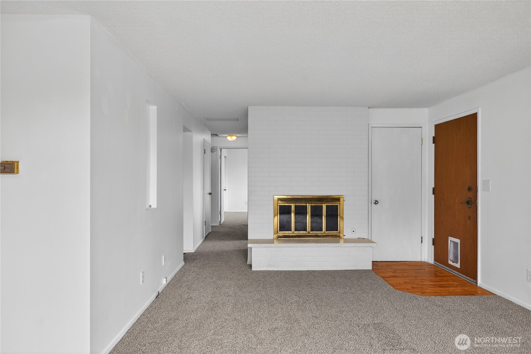 282 Southwest 10th Avenue Oak Harbor, WA 98277 - Photo 5 of 33 a view of a livingroom with wooden floor and cabinet