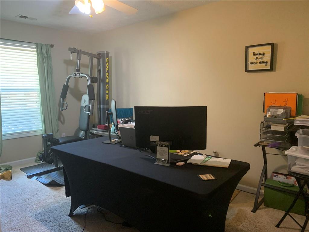 200 Syracuse Lane Covington, GA 30016 - Photo 15 of 22 a room with furniture and window