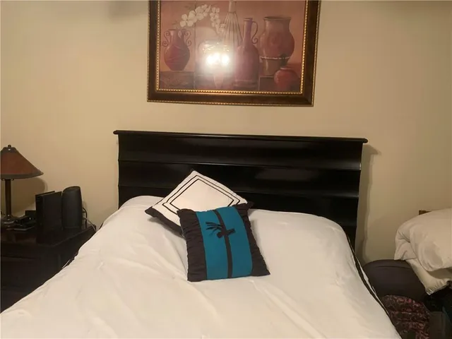 a view of bedroom and bedroom