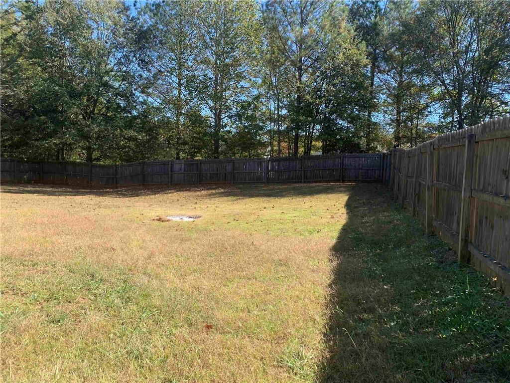 200 Syracuse Lane Covington, GA 30016 - Photo 21 of 22 a view of a swimming pool and outdoor space