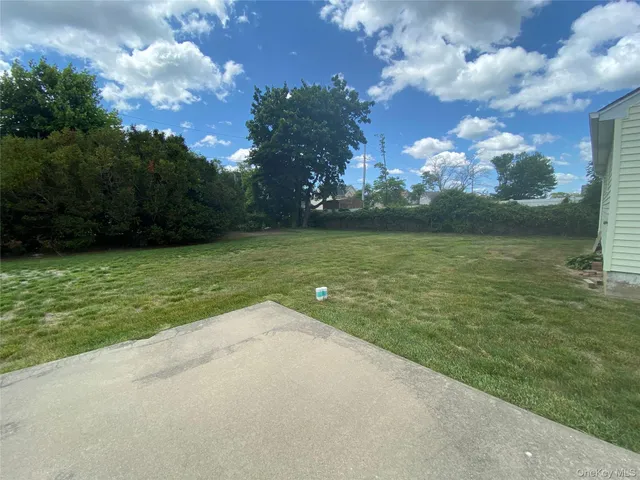 a view of a lake from a yard