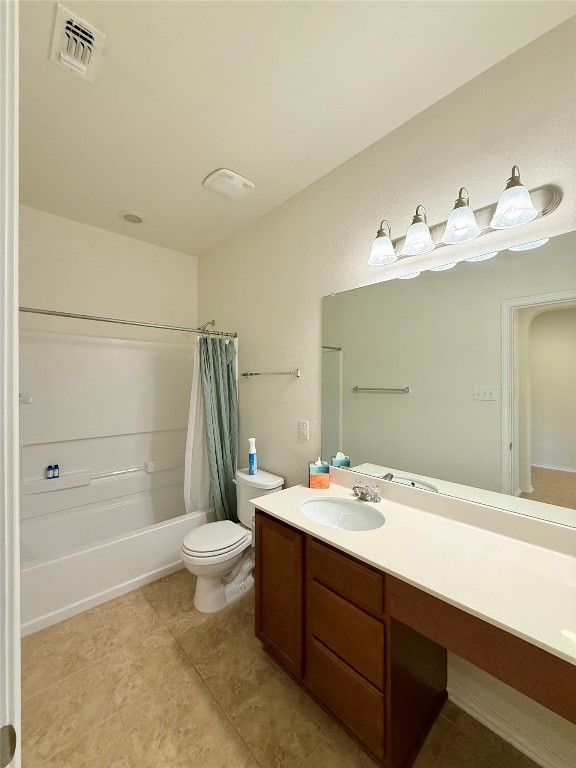 1140 Yellow Iris Road Leander, TX 78641 - Photo 12 of 23 Full bath with vanity, shower / bath combination with curtain, and light tile patterned floors
