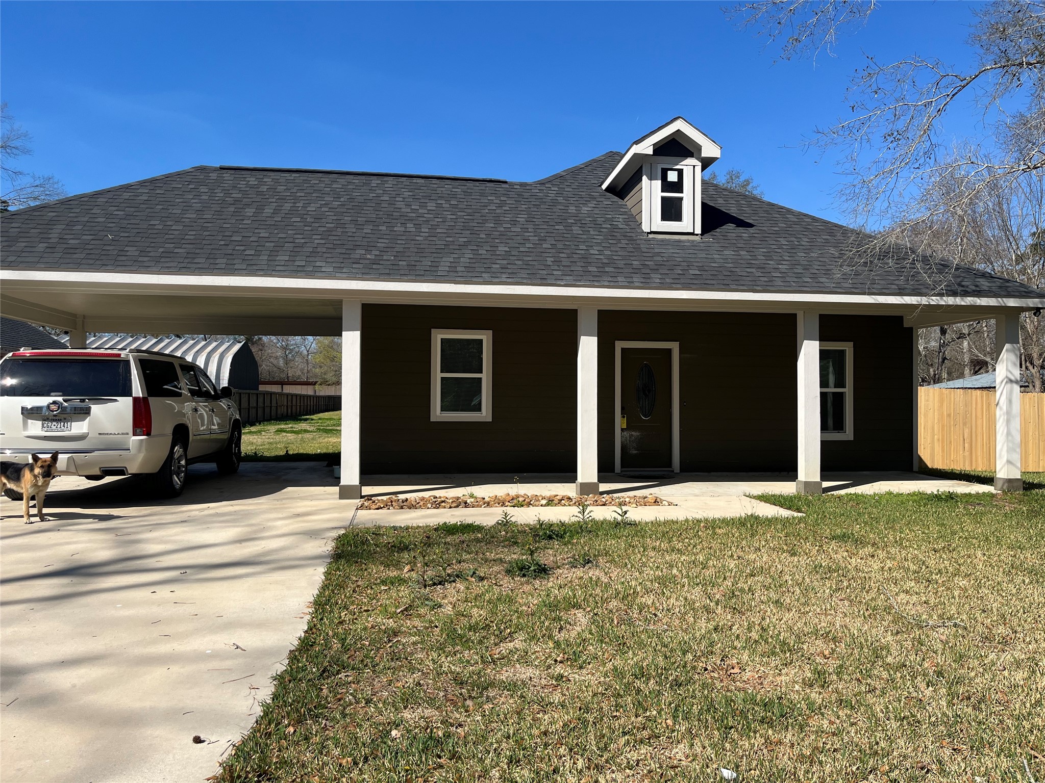 30023 Rosebud Street Magnolia, TX 77354 - Photo 20 of 21 a front view of a house with a yard