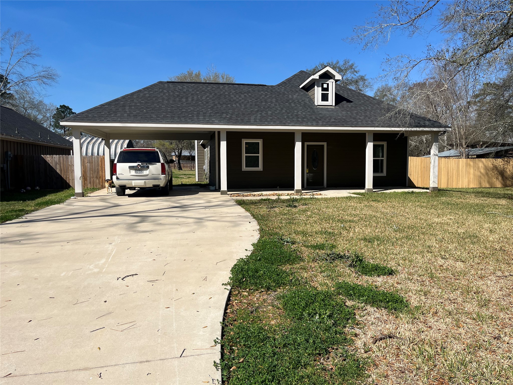 30023 Rosebud Street Magnolia, TX 77354 - Photo 3 of 21 a front view of a house with a yard