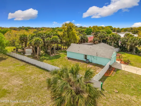 a view of a swimming pool with an ocean view
