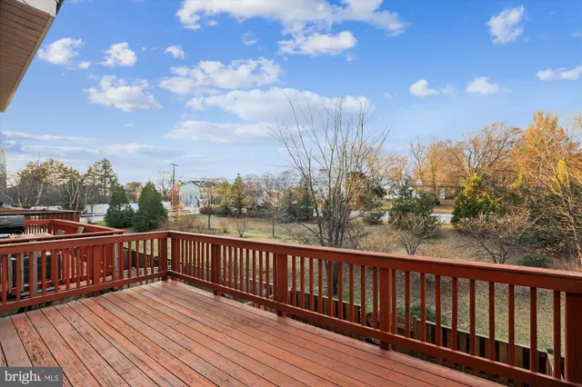 a view of city with wooden deck