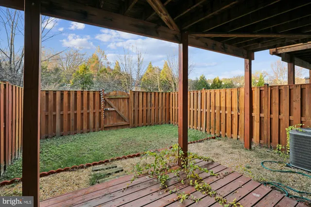a view of a porch with a backyard