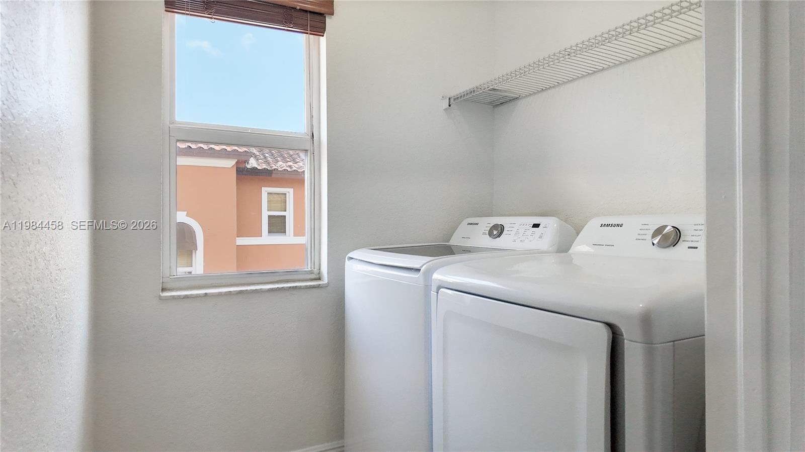 6002 Southwest 8th Street, Unit 3 West Miami, FL 33144 - Photo 10 of 10 a utility room with dryer and washer