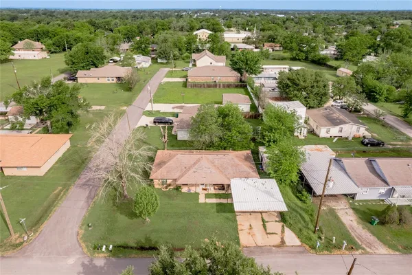 a view of a livingroom with furniture and a flat screen tv