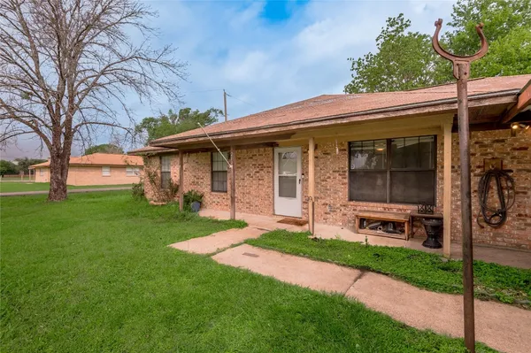 a kitchen with stainless steel appliances granite countertop a refrigerator stove microwave and sink