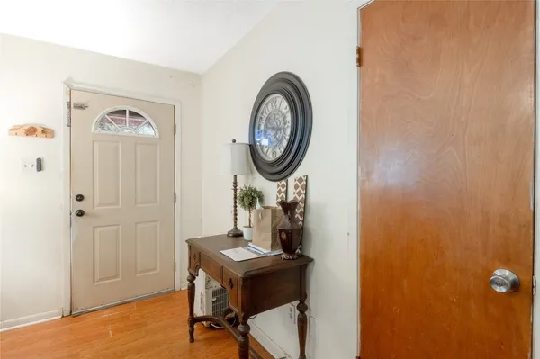 a bedroom with a bed and a fireplace