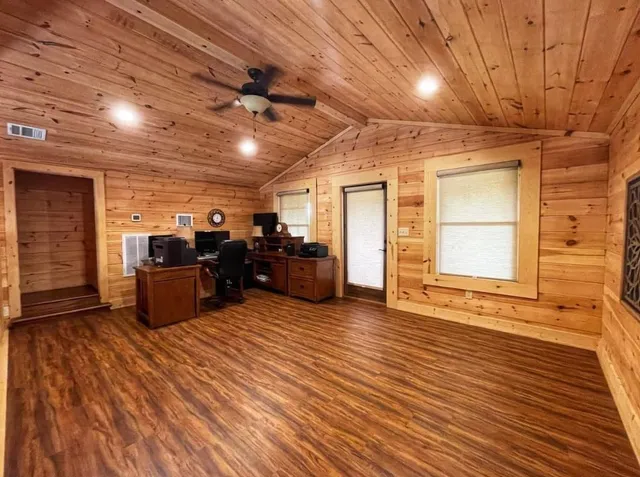a large room with wooden floor
