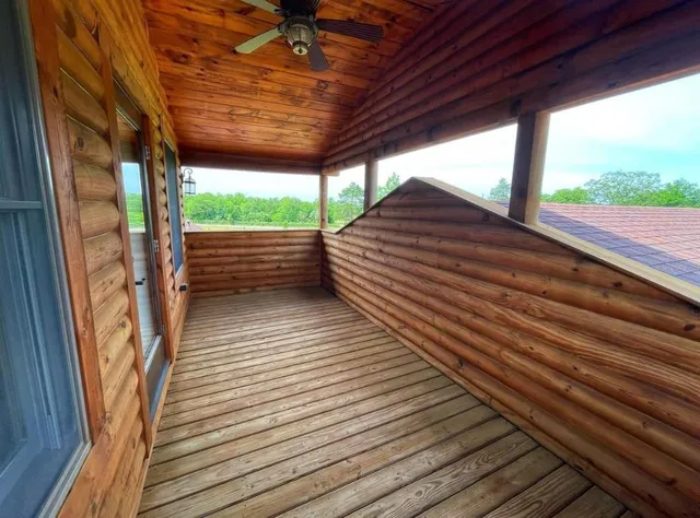 a view of outdoor space with wooden deck