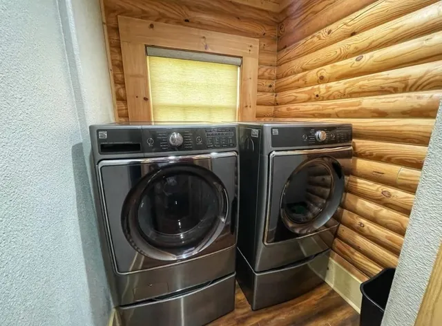 a utility room with dryer and washer