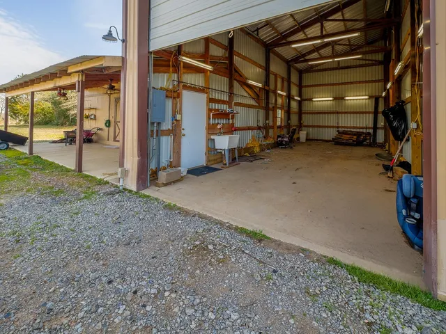 a view of an empty room with gym equipment