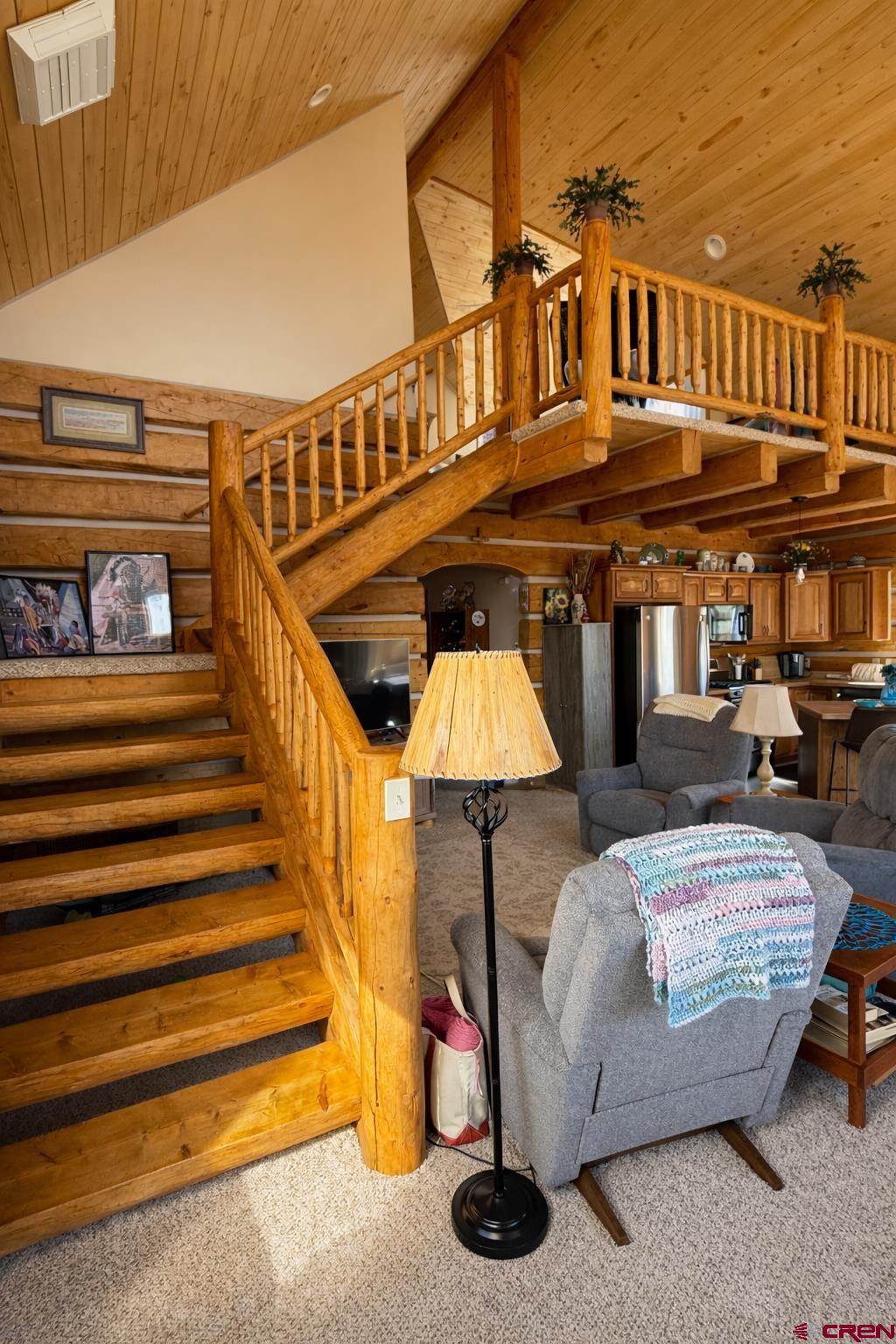 a view of a patio with table and chairs