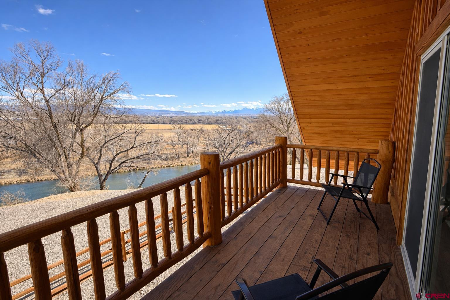6493 Townsend Road Delta, CO 81416 - Photo 11 of 38 a view of balcony with wooden floor and seating space