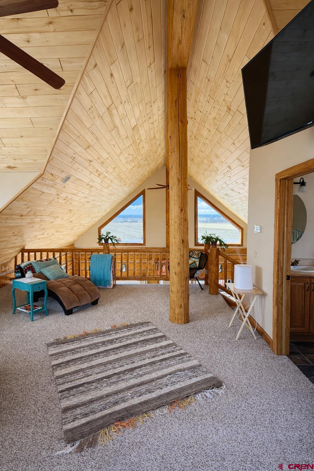 6493 Townsend Road Delta, CO 81416 - Photo 12 of 38 a roof deck with couch and chairs