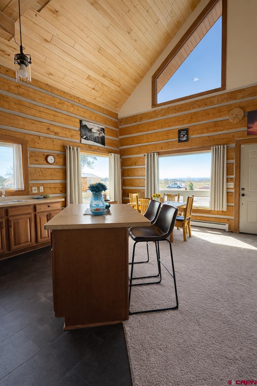 6493 Townsend Road Delta, CO 81416 - Photo 23 of 38 a living room with couches chairs and livingroom view