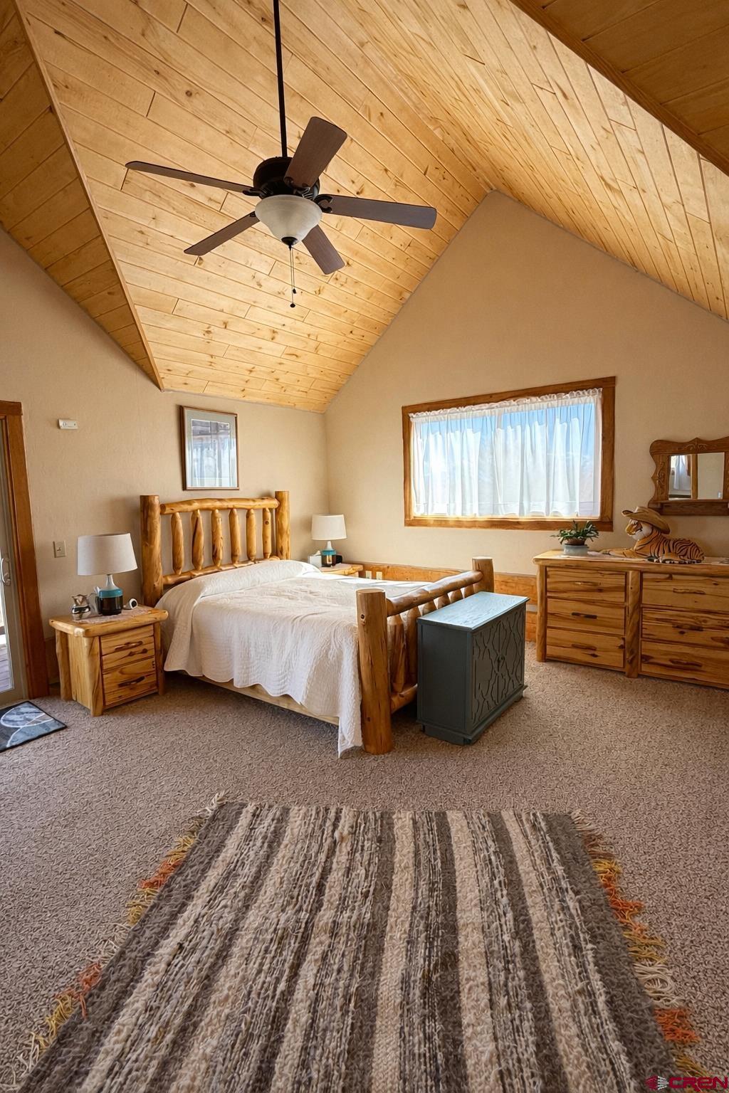 6493 Townsend Road Delta, CO 81416 - Photo 29 of 38 a bedroom with bed and window