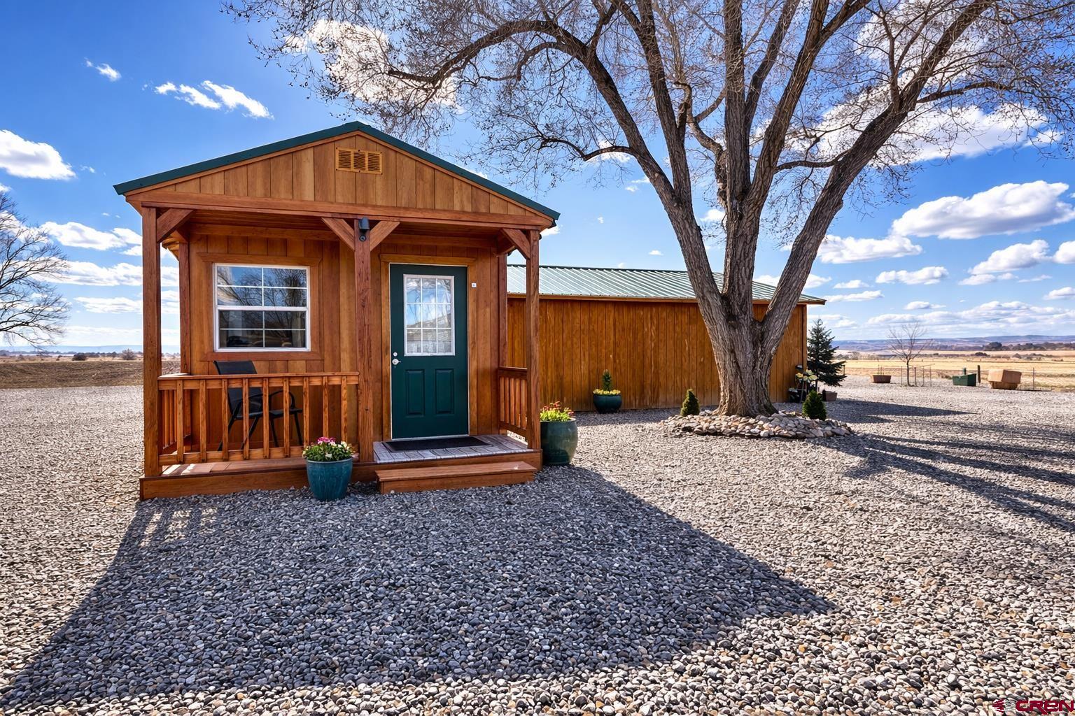 6493 Townsend Road Delta, CO 81416 - Photo 32 of 38 a front view of a house with a yard