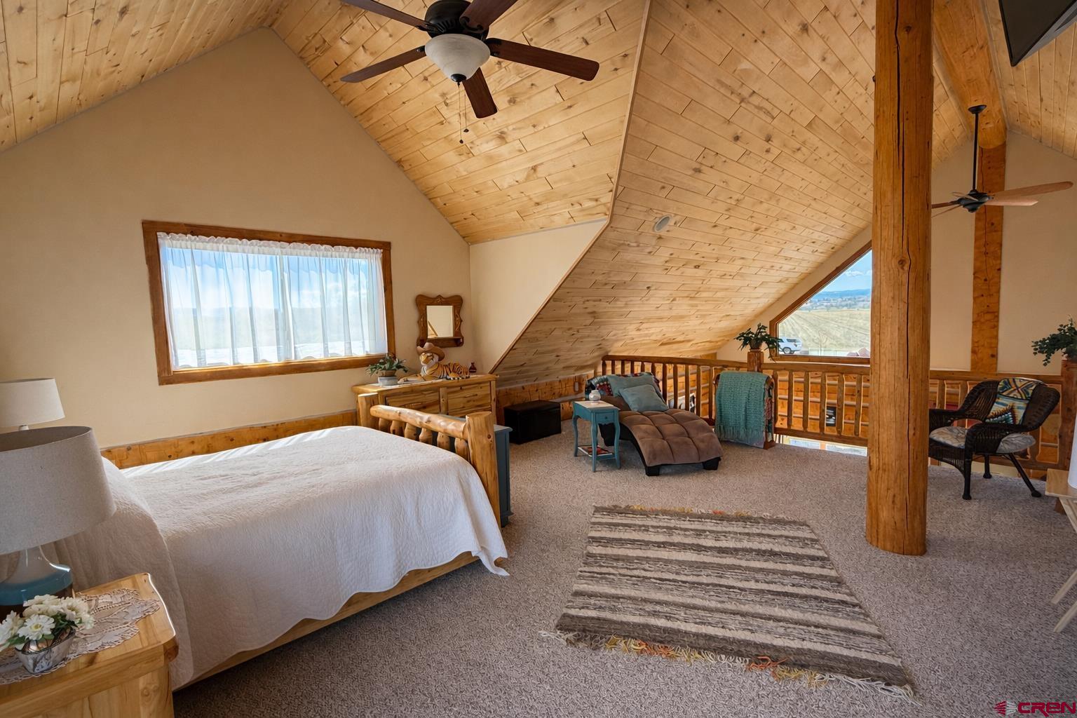 6493 Townsend Road Delta, CO 81416 - Photo 5 of 38 a bedroom with furniture and a window