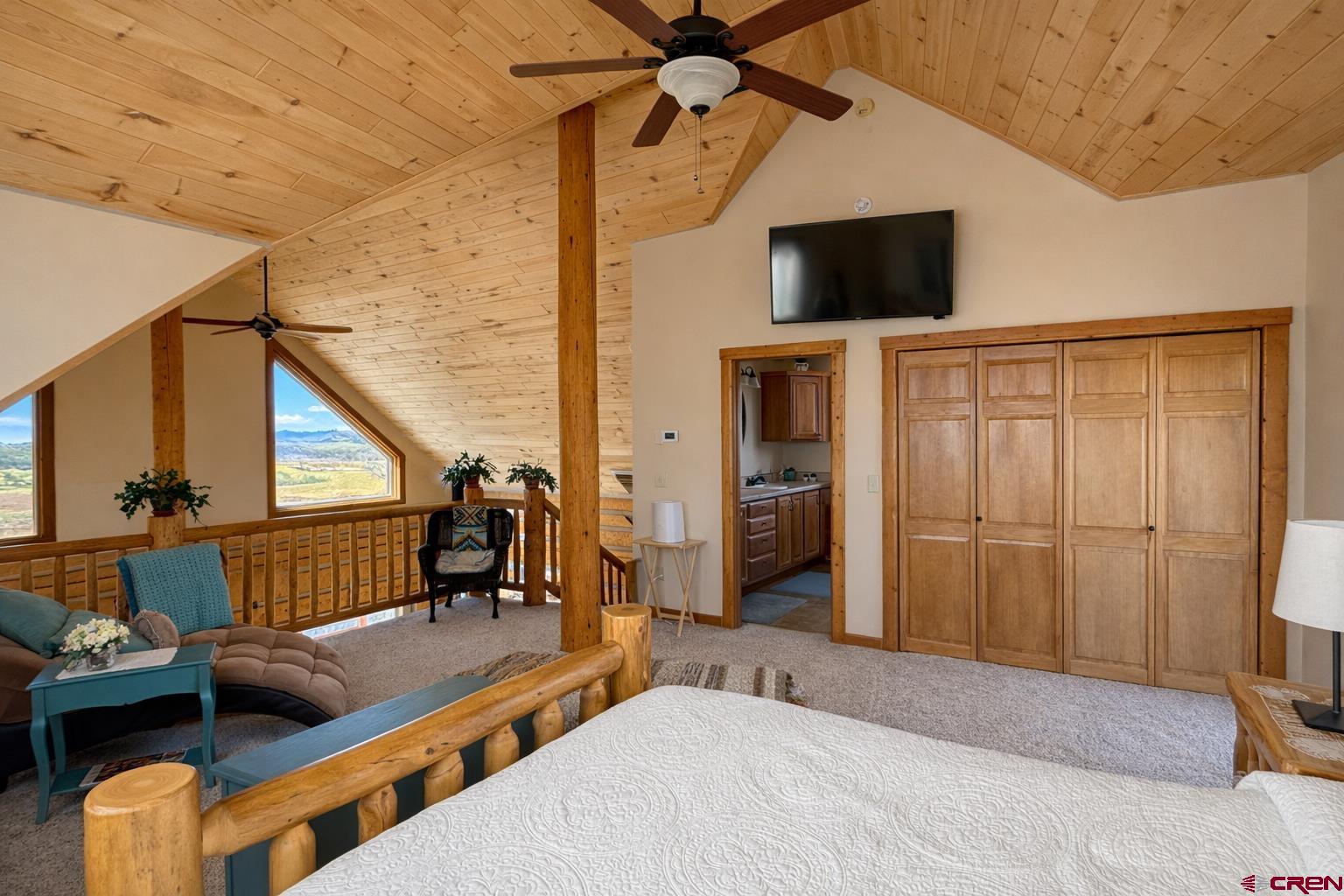 6493 Townsend Road Delta, CO 81416 - Photo 6 of 38 a bedroom with furniture and a window