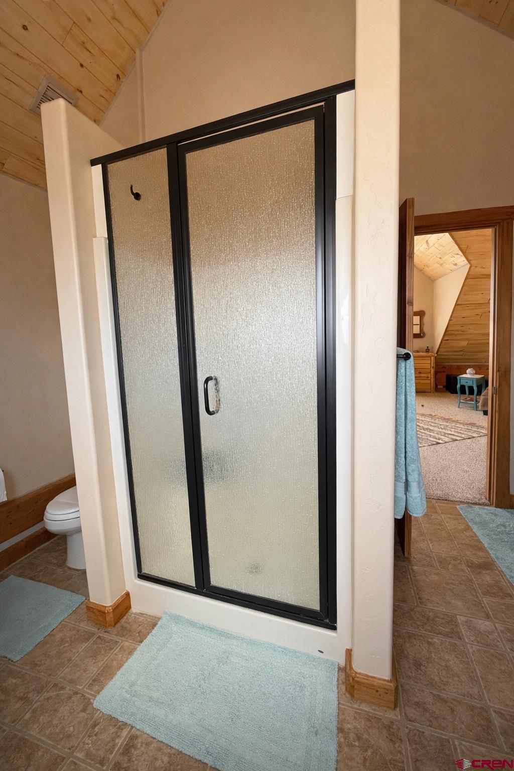 6493 Townsend Road Delta, CO 81416 - Photo 8 of 38 a view of a hallway with wooden floor and a livingroom