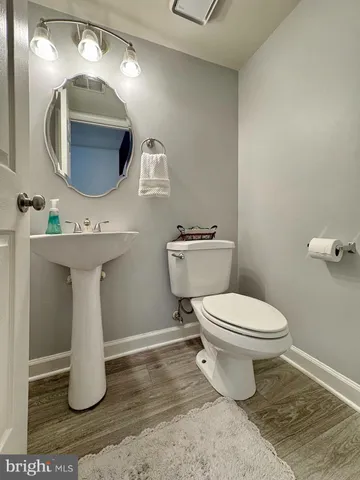 a spacious bedroom with a bed and a couch