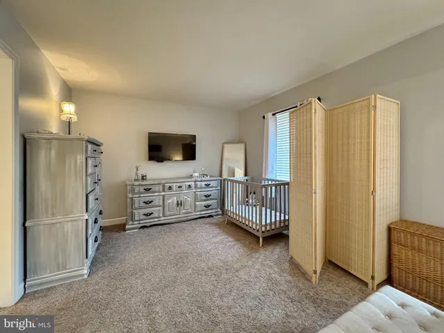 a room with furniture and window