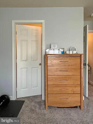 a view of a street with houses on both side