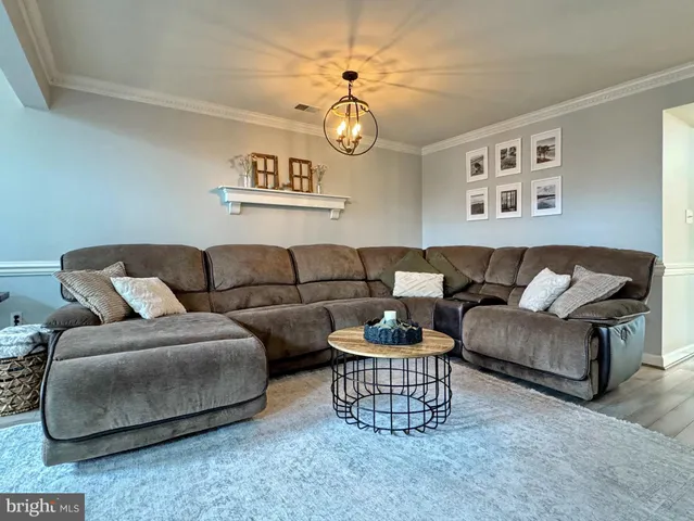 a bedroom with a bed and a lamp