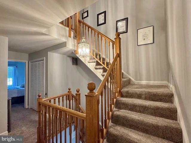 a view of a livingroom with furniture and windows