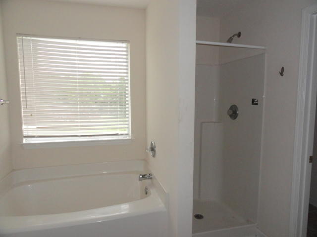 339 Dahlquist Drive Crestview, FL 32539 - Photo 14 of 15 a bathroom with a bathtub
