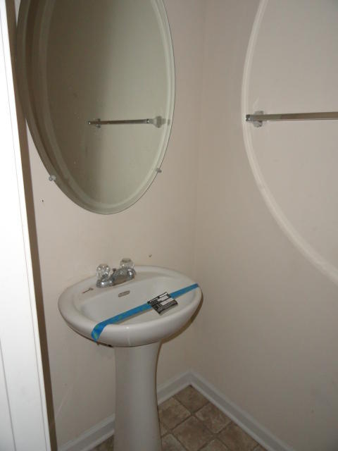 339 Dahlquist Drive Crestview, FL 32539 - Photo 3 of 15 a bathroom with a sink and a mirror