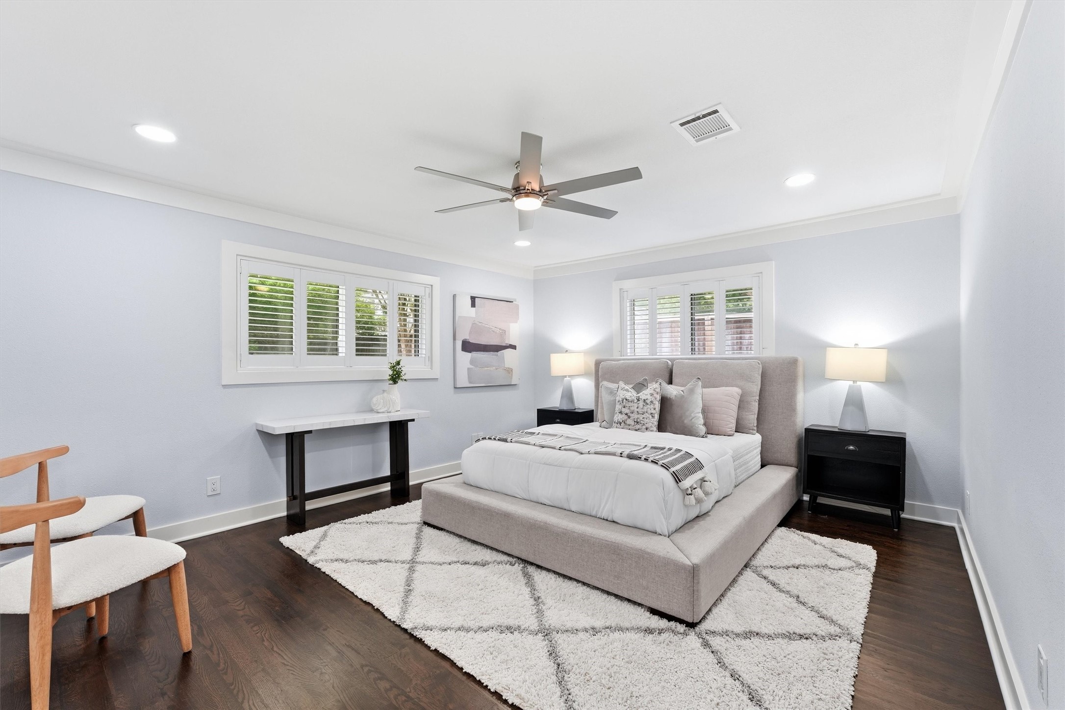 4701 Hummingbird Street Houston, TX 77035 - Photo 12 of 28 The serene primary bedroom, ready for your largest of furniture, or keep it streamlined and enjoy the additional seating area.
